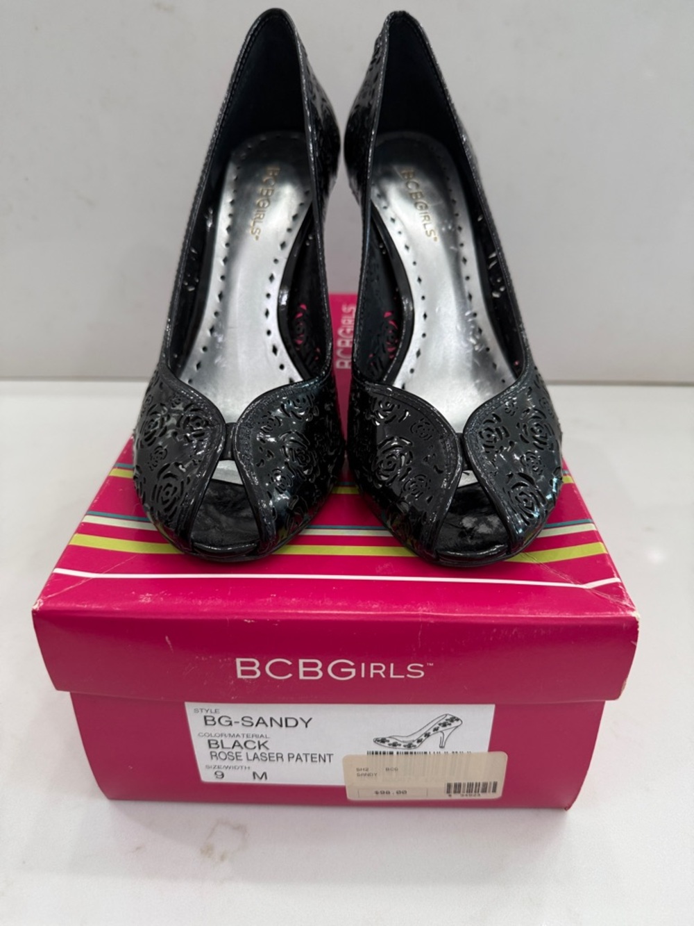 BCBGirls Black Patent Rose Laser Cut Peep Toe Heels – Size 9